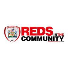 reds in the community Logo